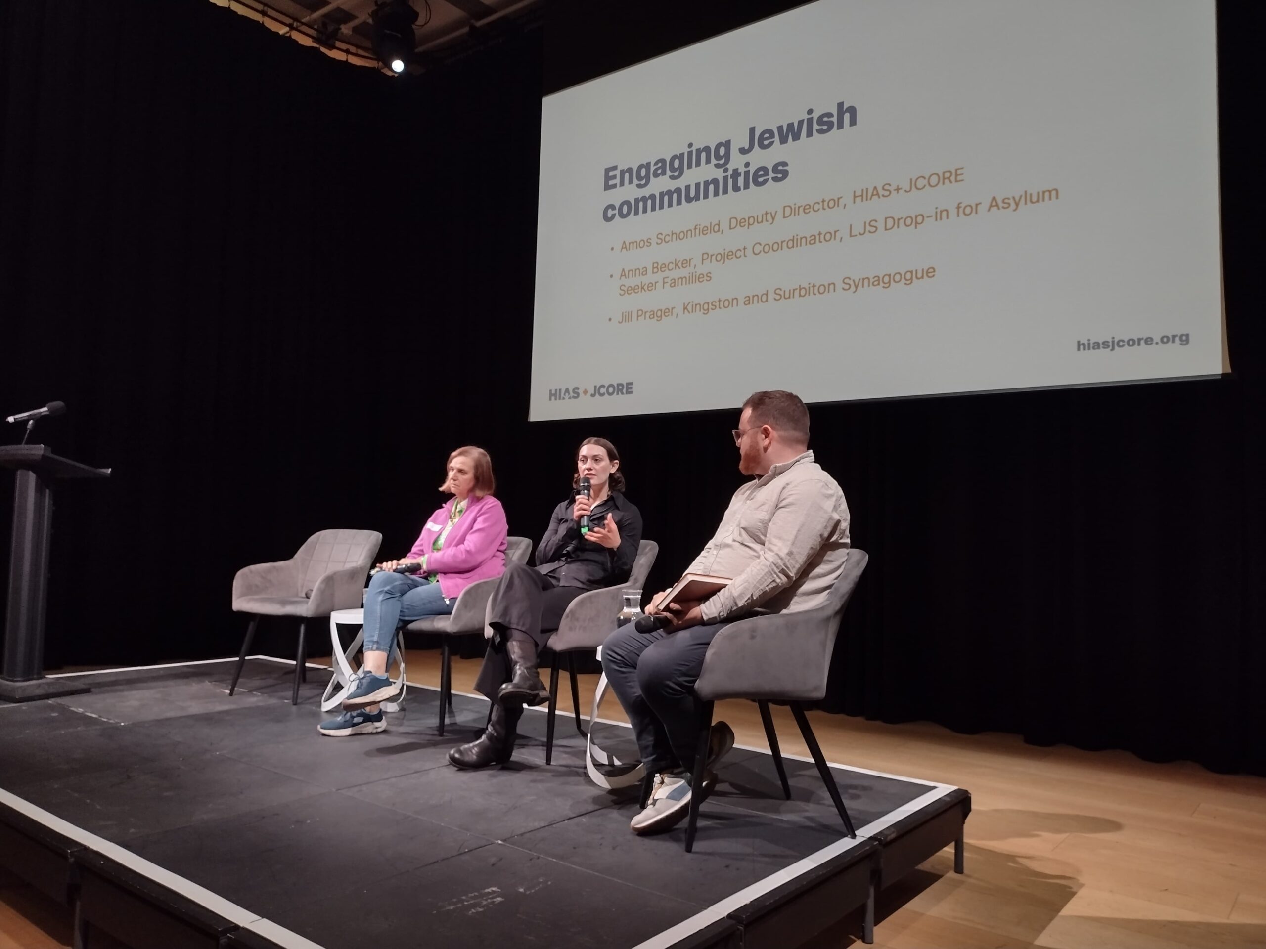 From left to right: Jill Prager (Kingston, Surbiton and District Synagogue), Anna Becker (LJS), and Amos Schonfield (HIAS+JCORE), sit on stage at our panel session.